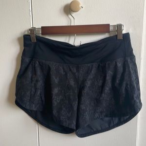 Lululemon size 6 tall long shorts.